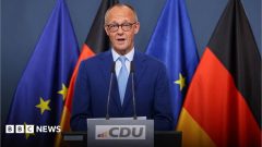 German Chancellor Merz vows to stay on despite 'disaster' in state election