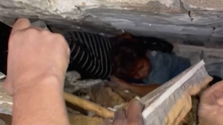 Rescue workers search for survivors after Gaza building collapse