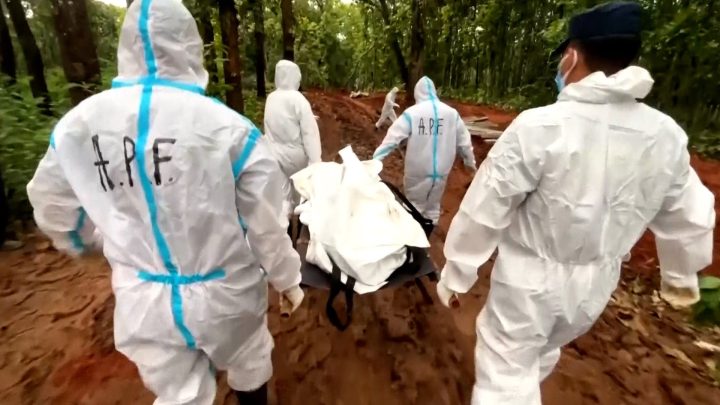 Nepal buries unidentified flood victims as families await answers