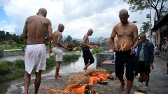 Nepal families hold symbolic funerals, thousands still missing
