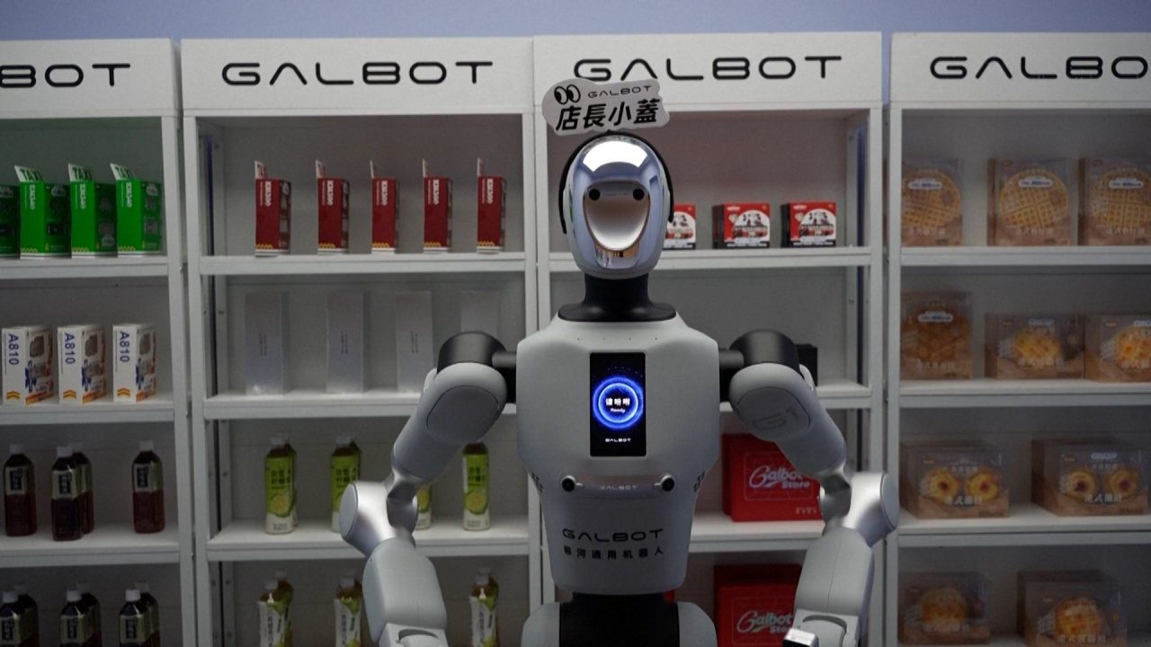 Shoppers interact with Hong Kong’s first robot shopkeeper
