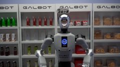 Shoppers interact with Hong Kong’s first robot shopkeeper