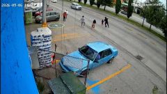 Moment shop worker dives into traffic to save child