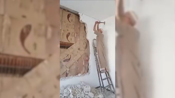 Syrian man uncovers library hidden behind wall for 15 years