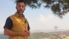 Israeli bombing seen behind journalist reporting from Lebanese village