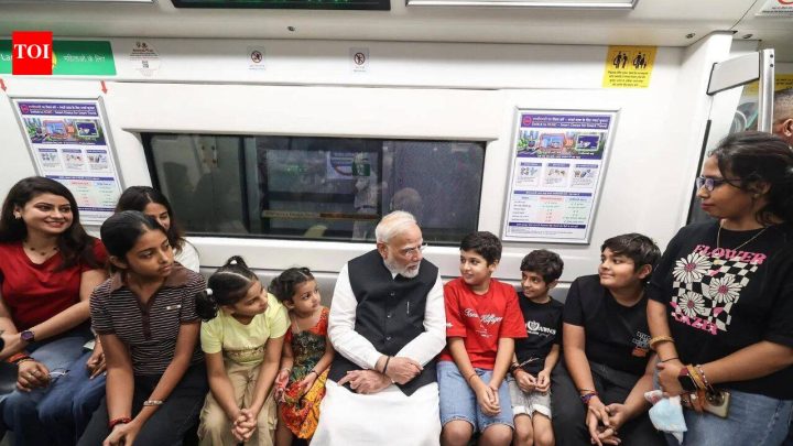 IndiaWatch: PM Modi takes Delhi Metro to SRCC, interacts with students