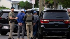 ICE agent charged with lying under oath about Minnesota shooting