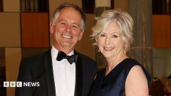 Australian MP loses both legs after alleged car attack, husband says