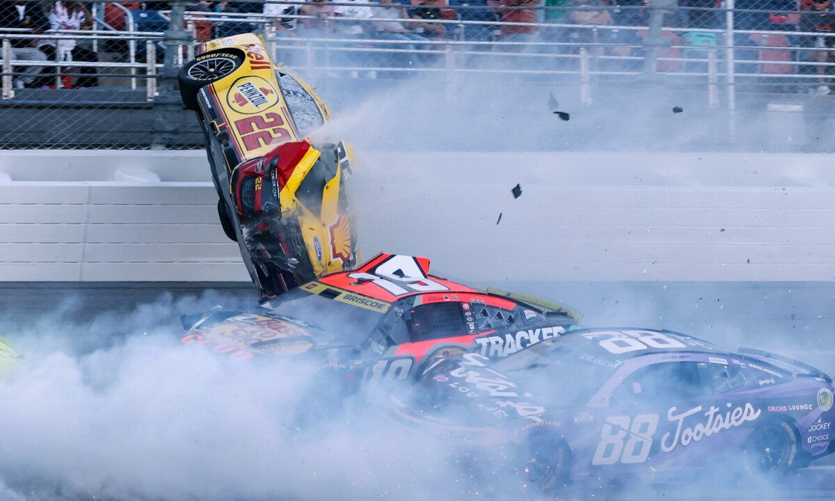 NASCAR race at Talladega stopped after Joey Logano's car goes airborne in scary 15-car wreck