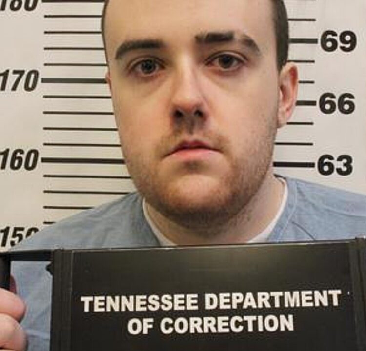Man serving a life sentence for murder slips through a fence and escapes a Tennessee prison