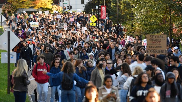 A crowd of students protest Cornell’s response to gang rape complaint