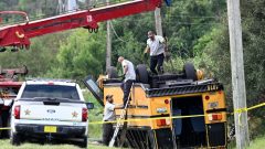 2 people killed, including a student, after Florida school bus rolls over in crash