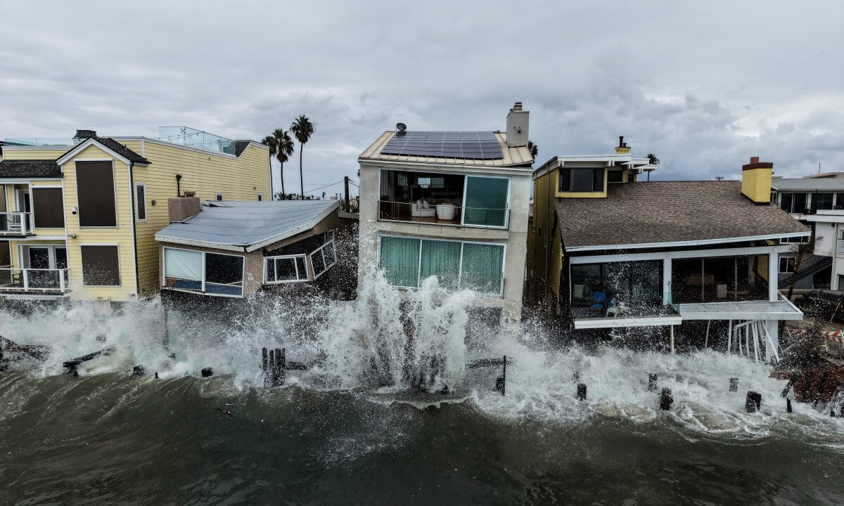 Using a drone, AP's Jae C. Hong frames Long Beach's waves crashing into oceanfront homes