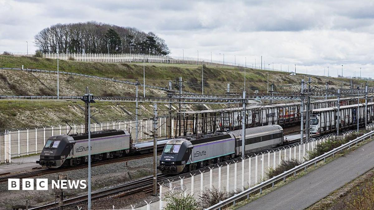 Bus hits train stopped on French side of  Channel Tunnel, with 19 injured