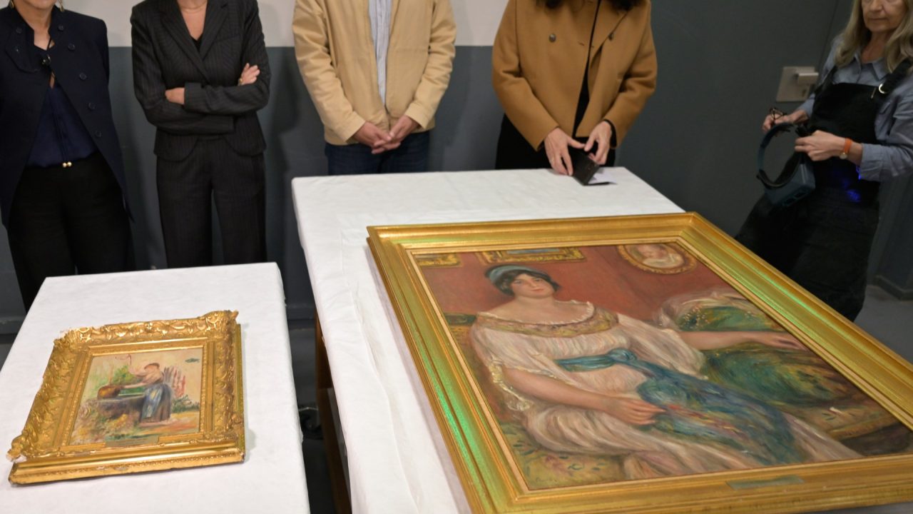Stolen Renoir paintings found behind wall in France following arrests