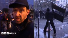 Fireworks and tear gas as protesters and riot police clash in Paris