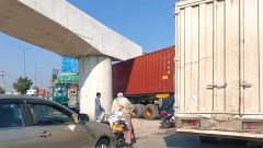 Container Truck Gets Stuck Under Newly Constructed Flyover in KP