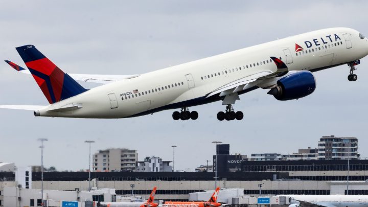 Rising fuel costs slashed Delta’s profit outlook despite strong demand