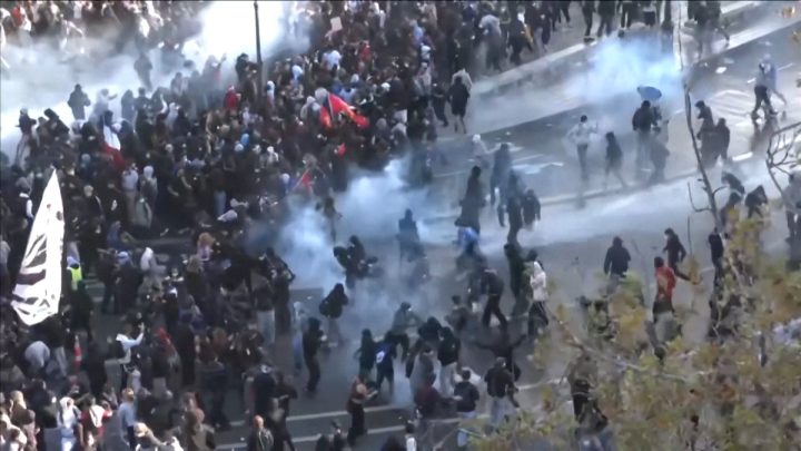 Police use tear gas and water cannons on student protestors in Paris