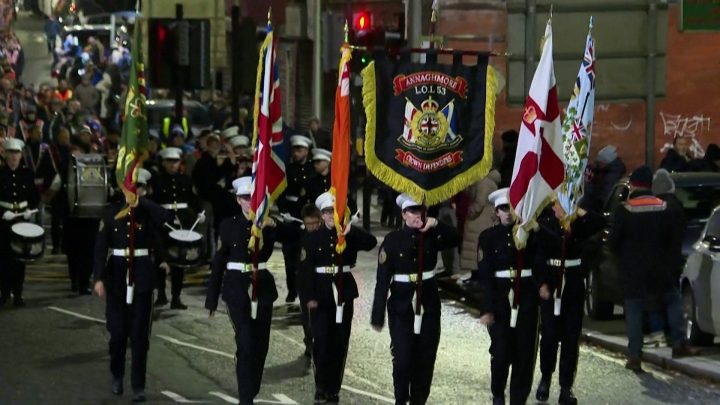 Thousands of Northern Irish Protestants march ahead of court ruling